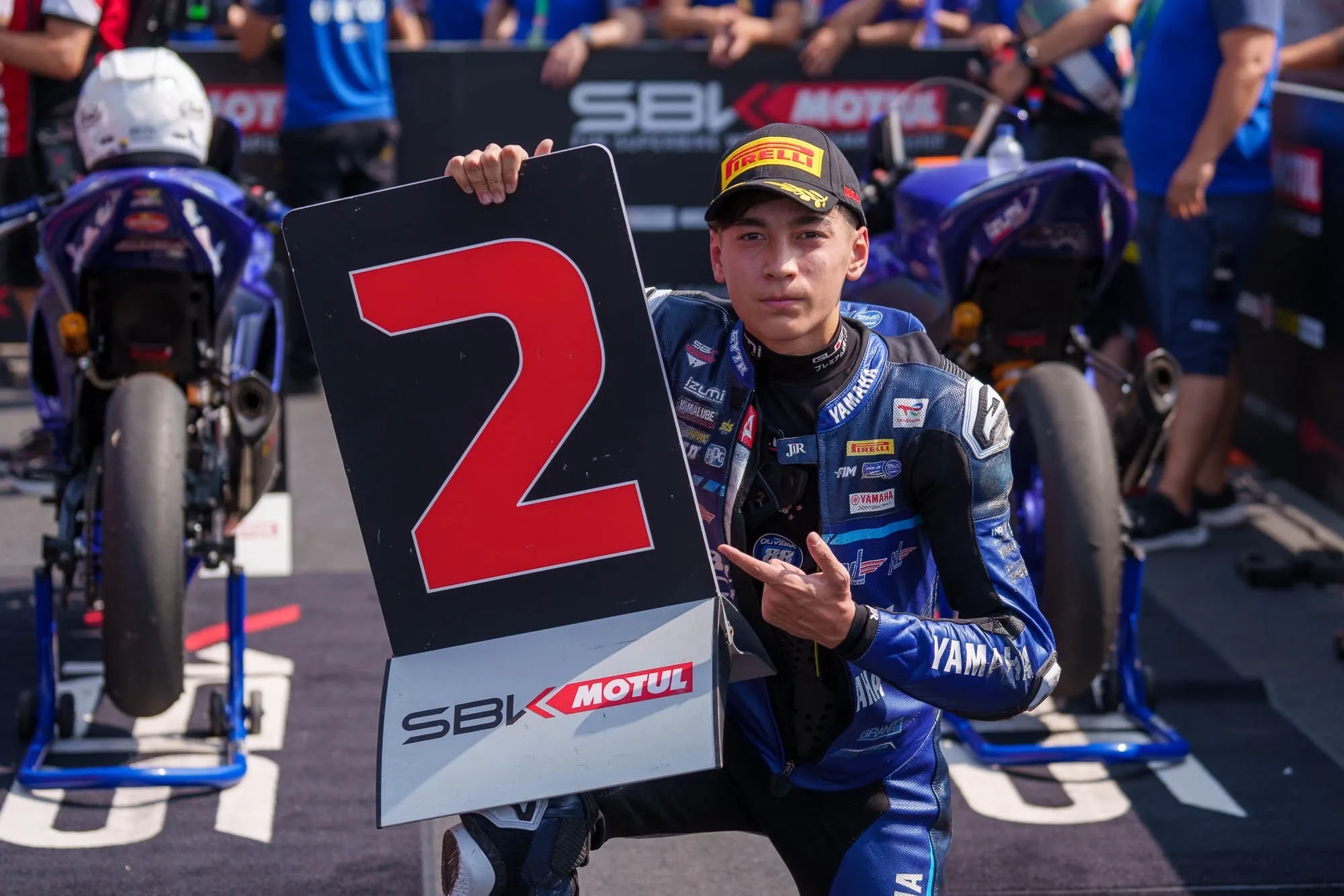 Jean Turner celebrates R3 World Cup podium.webp