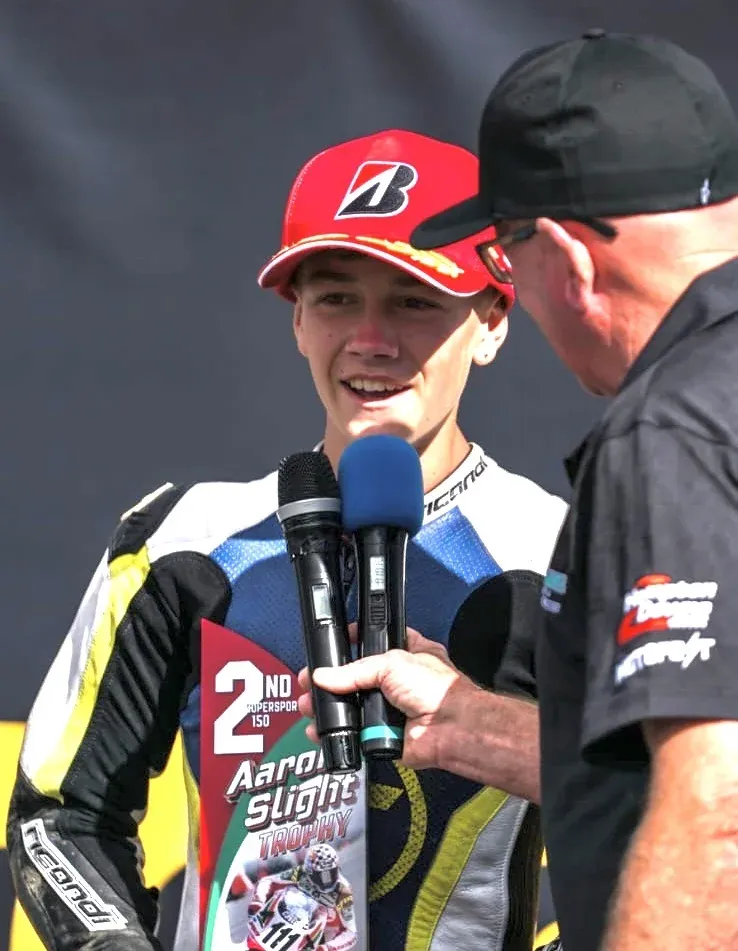 Ryder Chamberain on the podium.webp